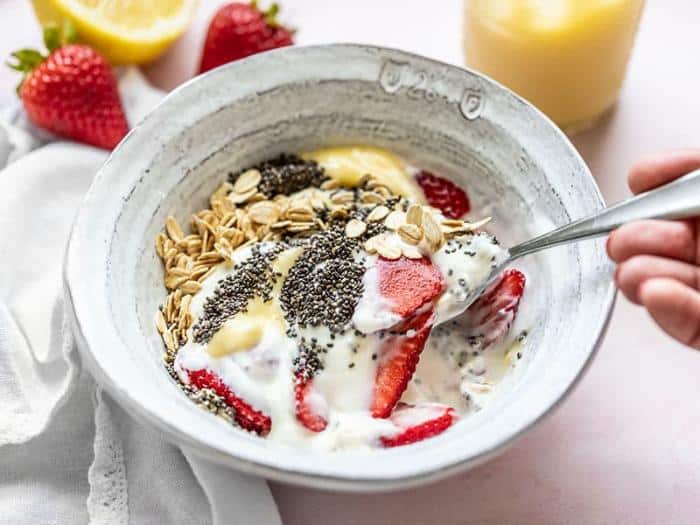 lemon berry yogurt bowl with spoon