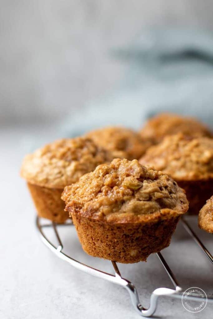 pear oatmeal muffins on cooling rack