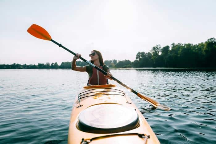 woman paddling in a kayak